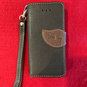 Black iPhone 6 wristlet case with brown clasp.